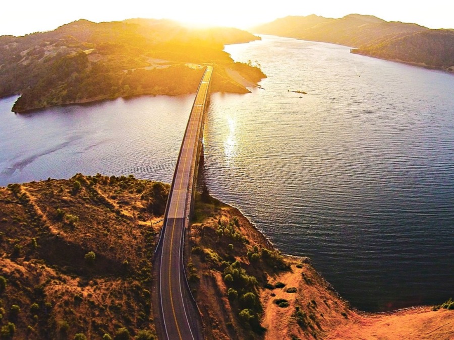 Lake Sonoma and the bridge glisten in the setting sun in Sonoma County