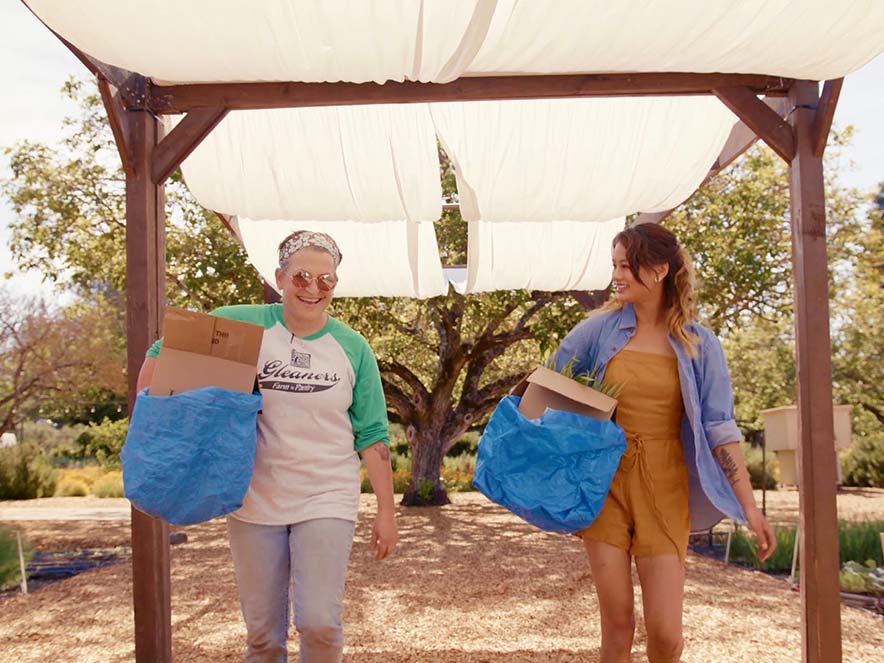 Image of two people gleaning for Farm to Pantry.