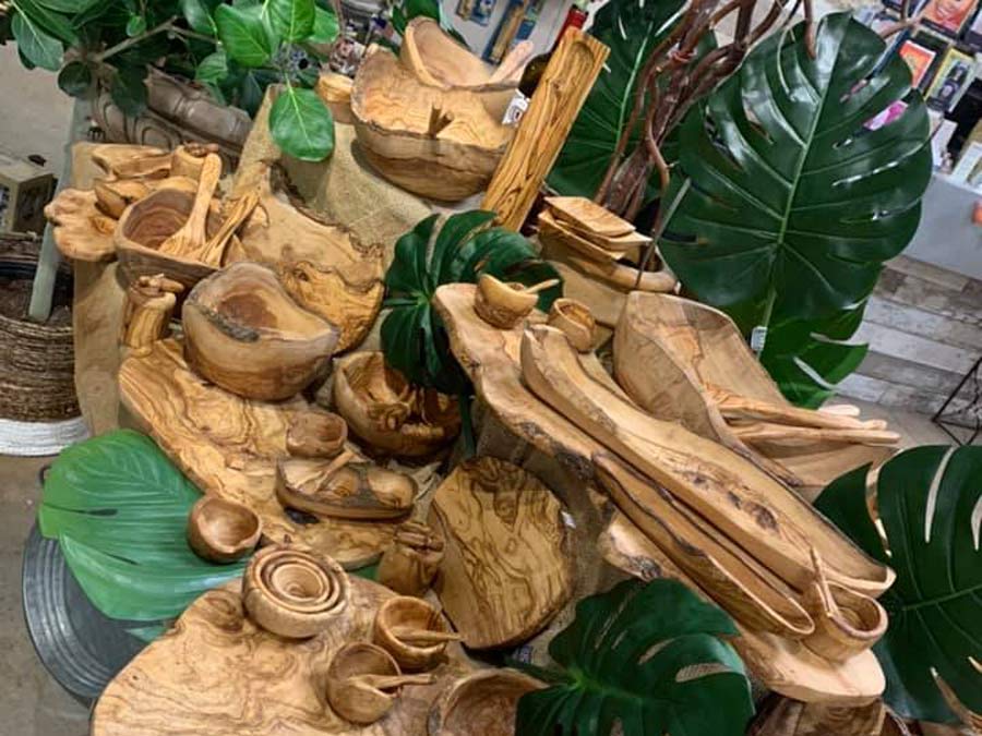 Natural wooden cutting boards and plants on a table