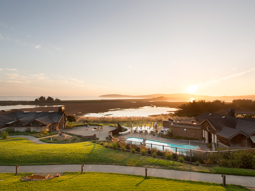 The sunsets over people having a barbeque at Bodega Bay Lodge, Sonoma County