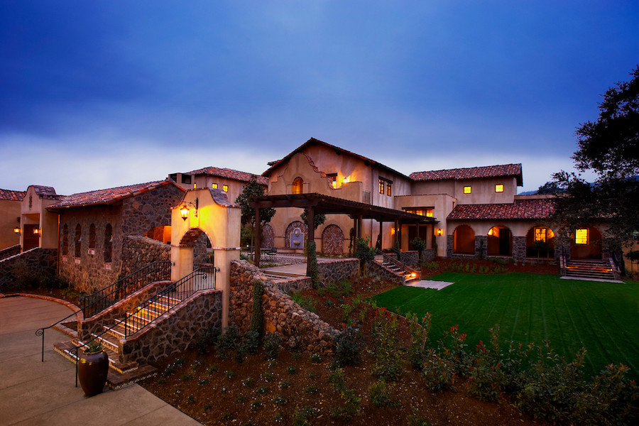 Exterior of Fairmont Sonoma Mission Inn & Spa at dusk 