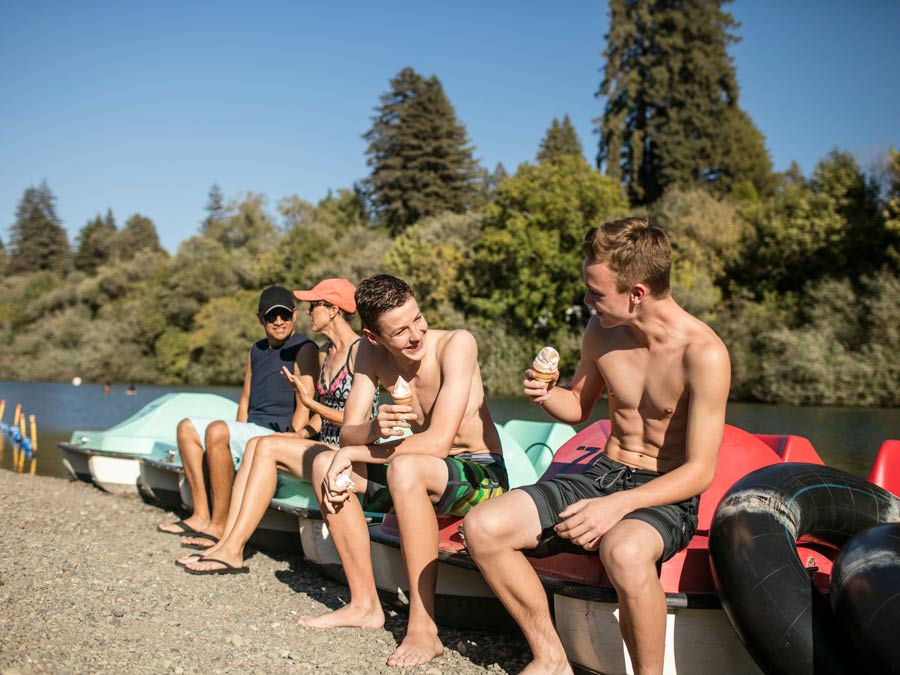 A family enjoys ice cream after tubing in the Russian River at Johnson's Beach, Guerneville