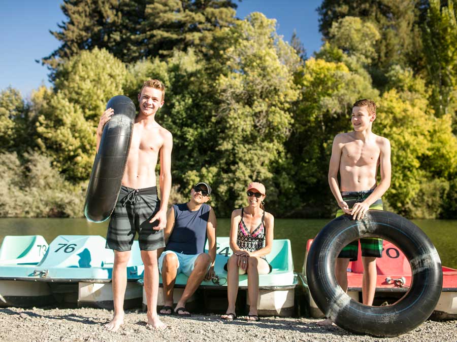 A family with inner tubes at the Russian River