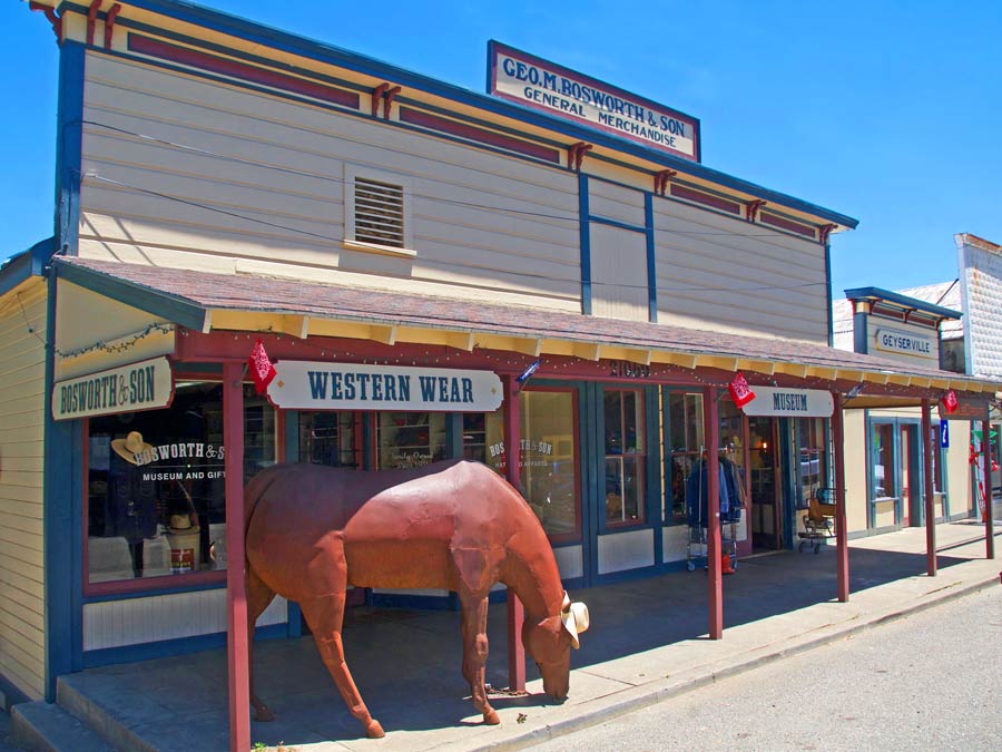 A sculpture of a horse sits outside of the western storefront