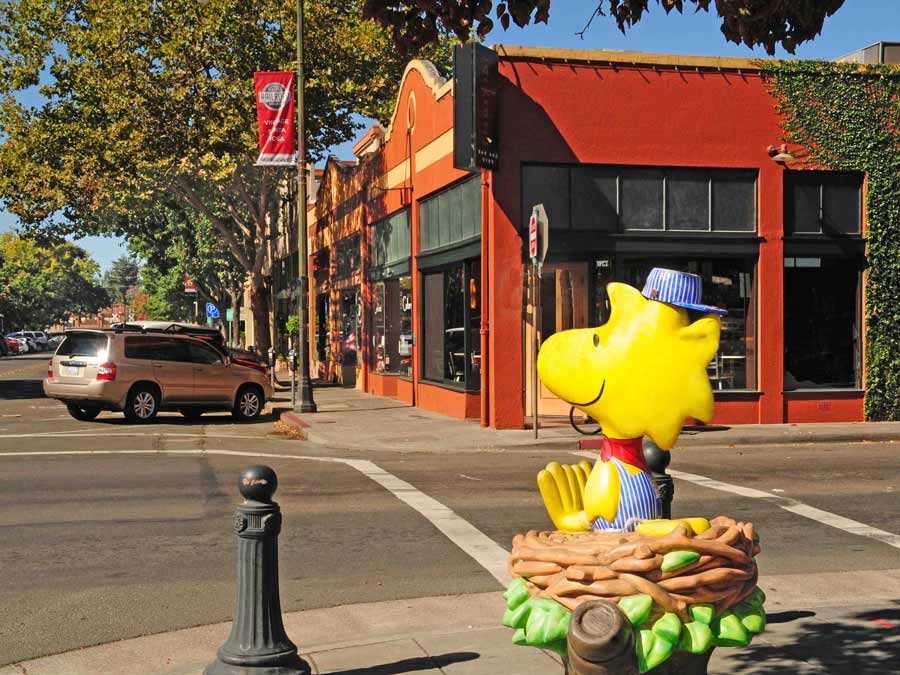 A statue of Woodstock dressed as train conductor in Railroad Square, Sonoma County