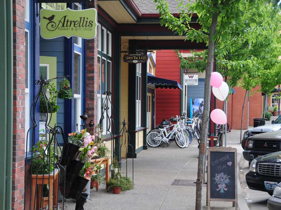 The town green is lined with shops