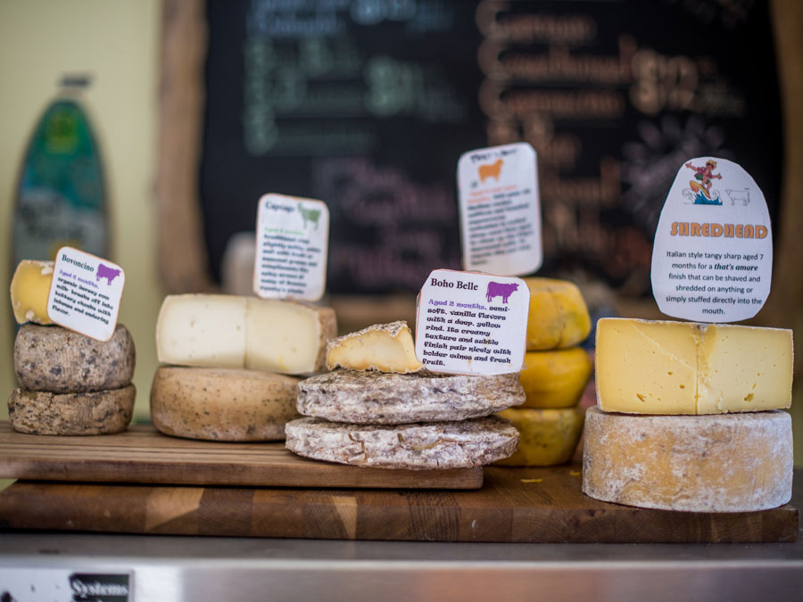 Rounds of cheese on display