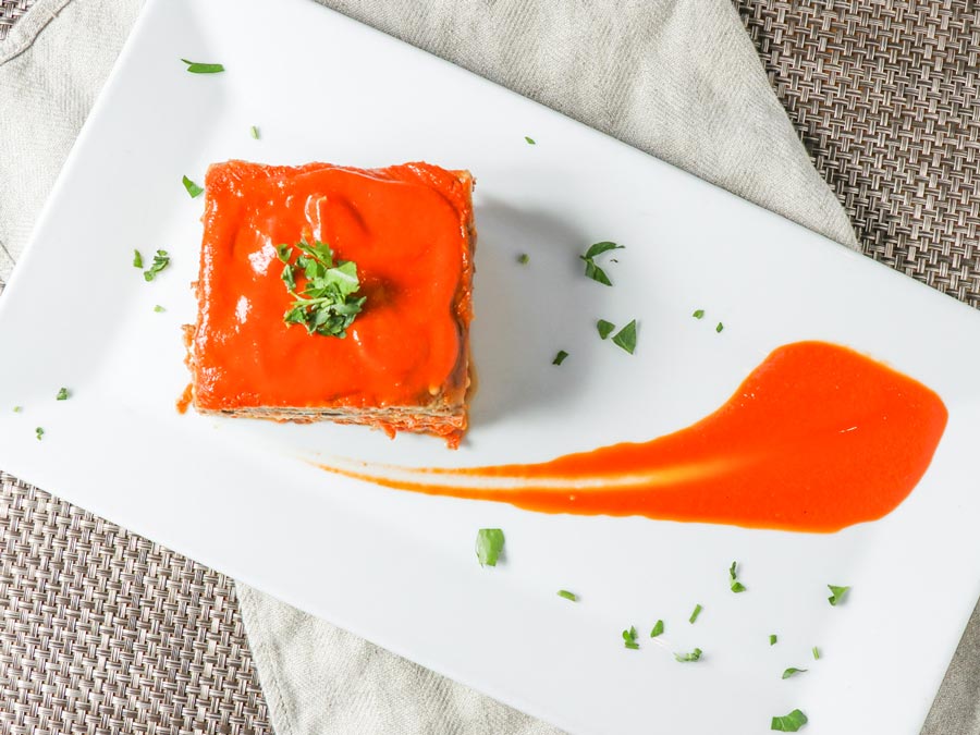 A plate with lasagna is artfully decorated at Risibisi in Sonoma County