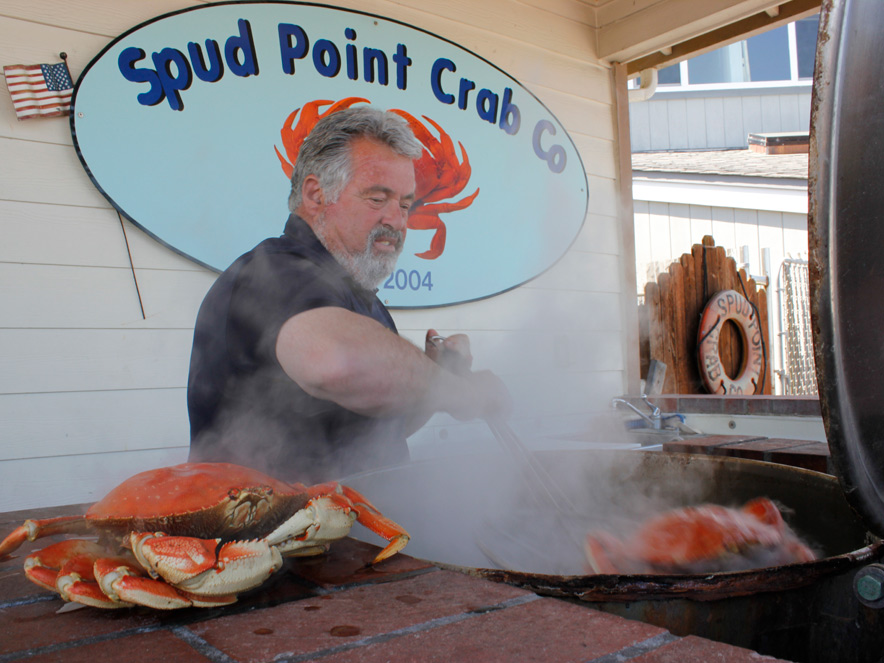 man cooking crab in Bodega Bay in Sonoma County