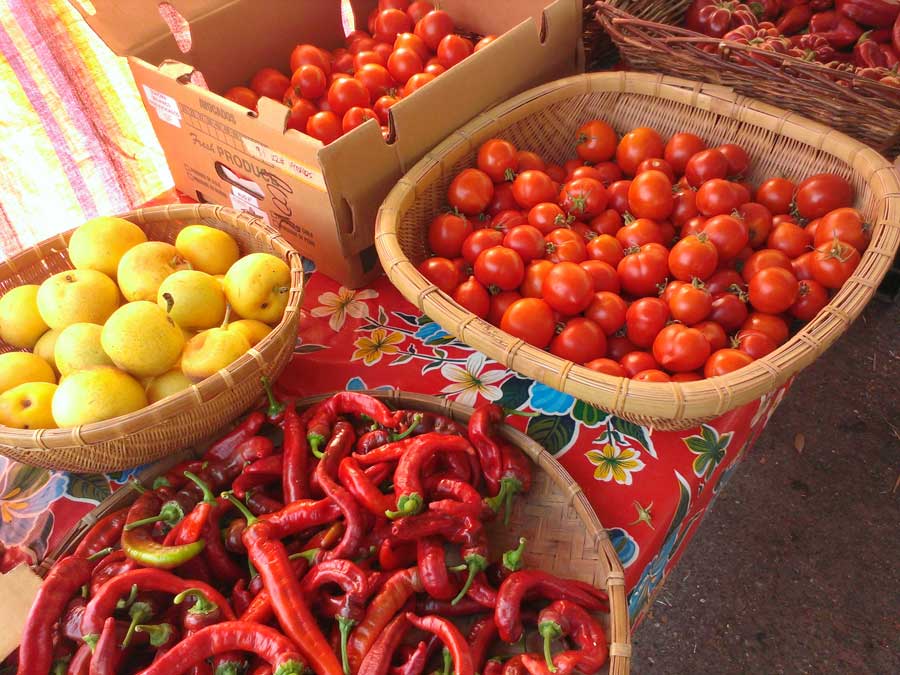 Peppers, tomatoes, and pears on a table at the Healdsburg Farmers Market, Sonoma County