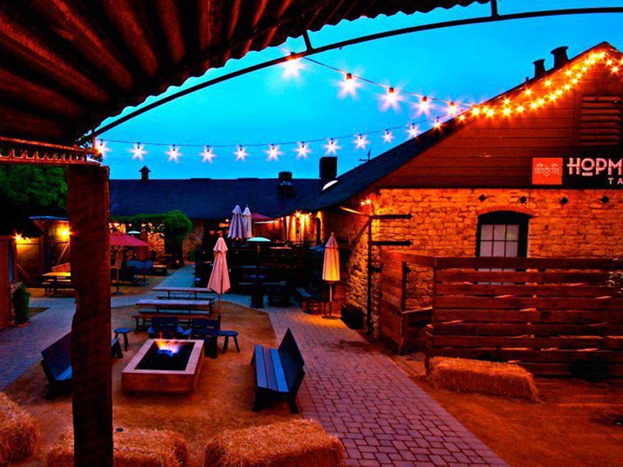 The beer garden is illuminated with lights at night at Hopmonk Tavern, Sebastopol