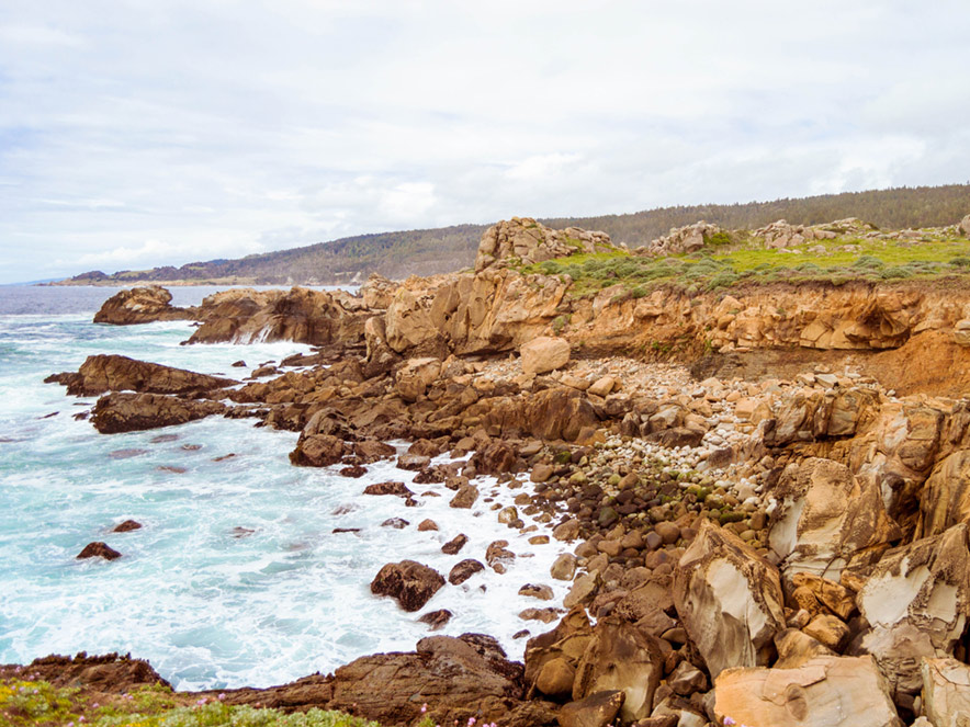 Rock formations meet crisp aquamarine waters at Salt Point State Park in Sonoma County, California