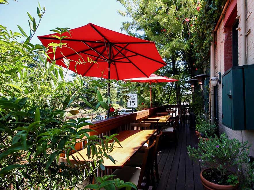 outdoor patio with tables set for dining