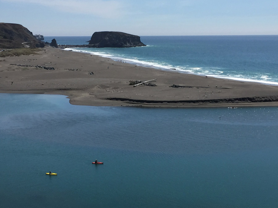 People kayak where the Russian River meets the Pacific Ocean at Jenner, Sonoma County