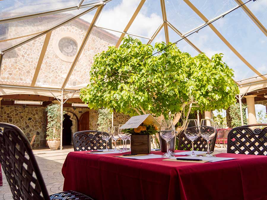 view inside pavilion with table settings