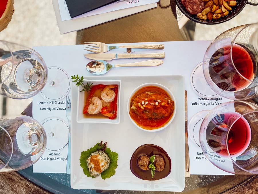 Small plates of tapas paired with wine