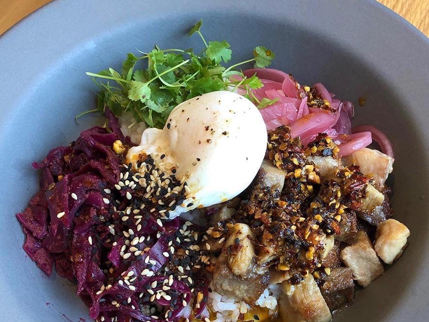 grain bowl with vegetables and egg