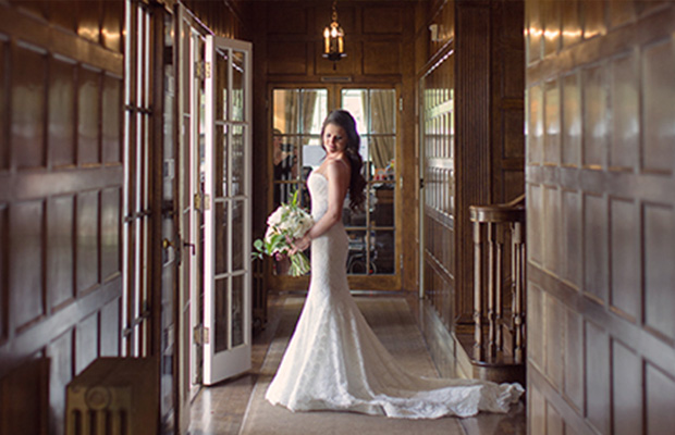 bride indoors holding flowers