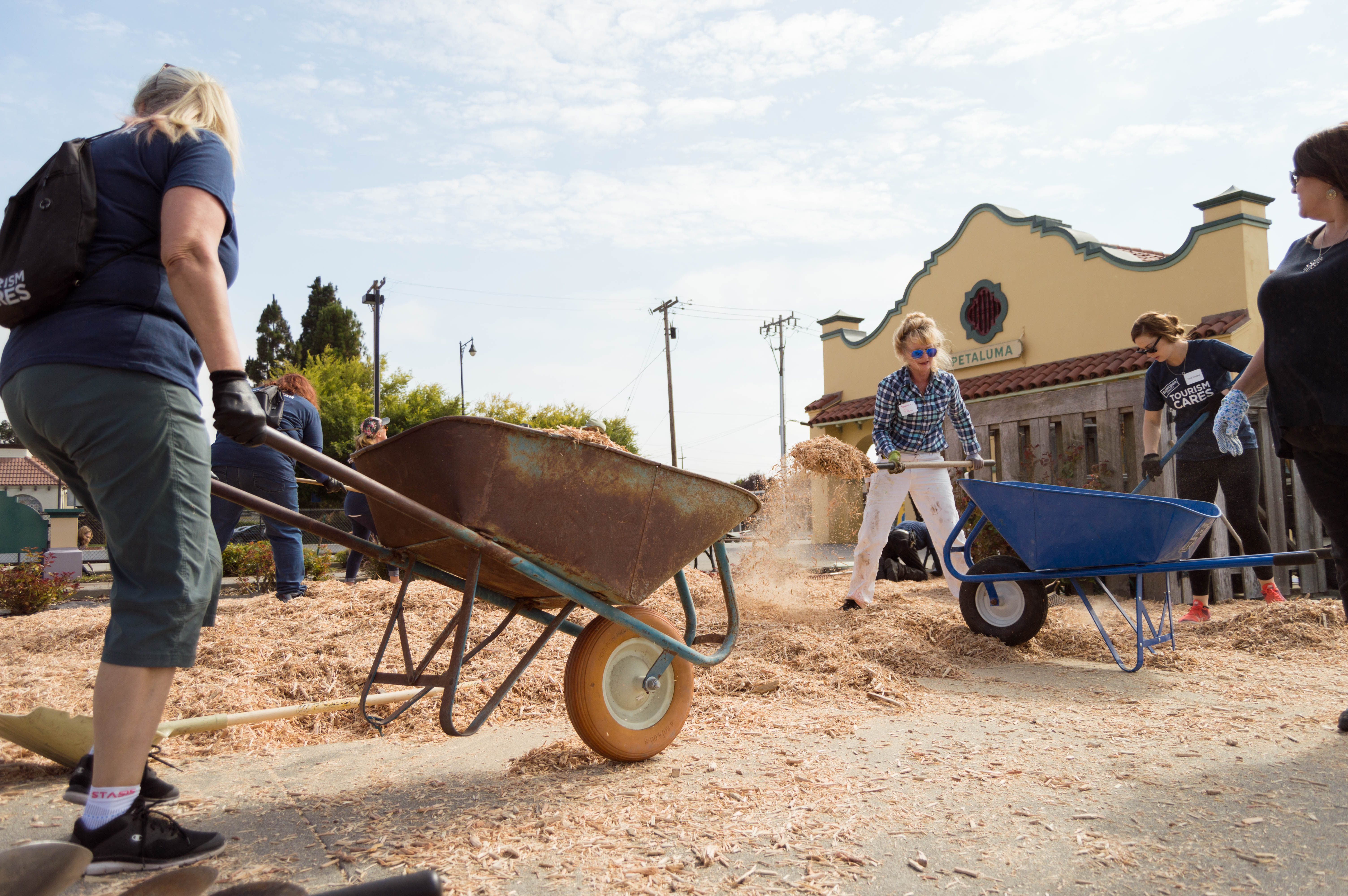 Volunteers work to beautify the Petaluma Visitors Center in Sonoma County, California